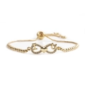 Detail of gold infinity bracelet with I Heart U symbols and zircon stone settings - Beaded Box Chain / Gold