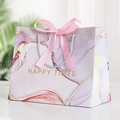 Purple marble pattern gift bag with Happy Times gold foil text and pink ribbon bow - Light Purple Flowing Gold
