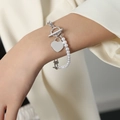 Elegant silver OT buckle bracelet featuring white shell pearls and a heart pendant charm - 20cm / Silver