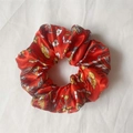 Elastic satin scrunchie with red floral pattern and shiny silk texture finish - Red Floral