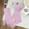 Close-up of pink knitted gloves with ribbed texture and brown D.D brand wrist label - One Size / Light Purple