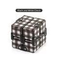 Macro shot of the black and white plaid infinity cube with metal rivets for stress relief - Infinity Cube (NO.168-8-39) / 67.6g / Black Plaid