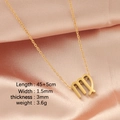 Gold-tone Virgo constellation necklace with 45+5cm chain on a pink silk background - Virgo