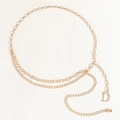 Minimalist multi-layer gold metal waist chain with D letter pendant on beige background - Gold