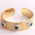 Bracelet jonc doré avec détails œil bleu et motif de points texturés pour femme - Bleu