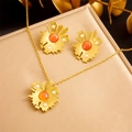 Parure de bijoux dorés avec pierres orange et accents de perles blanches - N2902