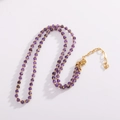 Detail of faceted purple beads and golden spacers with adjustable lobster clasp chain - 3MM Diameter / Amethyst
