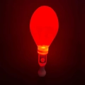 Close-up of a glowing red heart glow stick with a white handle and control button - Oval Sand Ball Wand Red