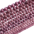 Macro shot of purple cat eye beads for DIY jewelry making and craft projects - 4mm (Approx 90pcs) / Fuschia