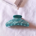 Teal marble pattern acetate hair claw clip for elegant bun hairstyles on white fabric - Light Blue