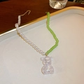 French vintage pearl necklace with green beads and a colorful translucent bear pendant - Spliced Green Pearl and Iridescent Bear Necklace