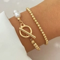 Ensemble de bracelets dorés avec perles et fermoir en T portés au poignet - HS596-13 Or Perle Ensemble 2pcs