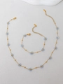 Detailed view of light blue beaded flower necklace and bracelet set with S.STEEL stamp - Grey Blue Necklace And Bracelet