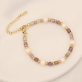Detailed view of handmade beaded bracelet with purple stones, pearls and S.STEEL clasp - 5# Amethyst