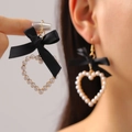 Detail of heart-shaped pearl earrings featuring black silk bows and golden hooks - Black Satin Bowknot Artificial Pearl Heart Style (1441) / Black