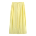 Front flat lay of high-waisted pale yellow wide leg trousers with double waist pleats - XS / Yellow Pants