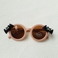 Kids bat-shaped sunglasses with pink matte frames, UV400 lenses and spooky bat accents - Pink