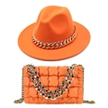Vibrant orange fedora hat and matching quilted handbag with chunky gold chain details - Orange Hat + Bag