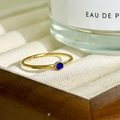 Minimalist 18K gold plated stainless steel ring with a round navy blue birthstone - September - Blue (Sapphire)