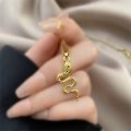 Snake pendant necklace in 18K gold finish with colorful zircon stones on satin background - 0618-Gold Snake Multicolored Stones