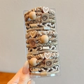 Set of earthy tone elastic hair ties with heart and smiley charms in a clear box - 15 Piece Set / Khaki