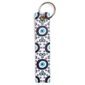Detail of blue evil eye faux leather keychain with silver metal ring and textured finish - Dark Blue Evil Eye Pattern Style (BE1657BU03)