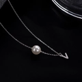 S925 sterling silver V-letter necklace with white pearl pendant on black fabric - Letter V