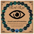Detailed view of green tiger eye beaded bracelet with evil eye charm on display card - Green Tiger Eye Bracelet