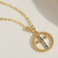 Detailed macro view of 14K gold-plated cross pendant with multicolor zircon stones - Round Cross