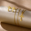 Detailed view of golden cross pendant and stud earrings set on elegant metallic texture - Gold Cross (TZ-483)