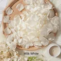 Artificial rose petals in creamy white for wedding decor with a soft silk texture - Cream