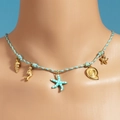 Blauw en goud geweven ketting met hangers van schelp en zeester op een model - Blauw Goud Gevlochten Marine Stijl (Met Blauwe Zeester & Zeemeermin)