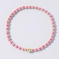 Minimalist bohemian beaded bracelet featuring rose red and golden beads with elastic design - Fuchsia and Gold