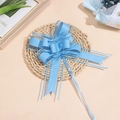 Dettaglio fiocco in organza azzurro con texture in raso a doppio strato per pacchi regalo - Blu