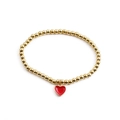 Minimalist gold beaded bracelet featuring a vibrant red heart pendant for women - Red