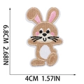 Detail view of Easter bunny embroidery patch with precise dimensions 6.8cm by 4cm - Brown Rabbit