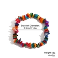Elastisches Perlenarmband mit bunten, unregelmäßigen Natursteinen und Maßen - Mehrfarbige Muschel Elastisch