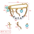 Detailed view of evil eye brooch with blue bow, dream beads and gold tone charms - DREAM Letter Bow Cross Heart Style (BE1728LBU00)