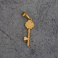 Vintage golden stainless steel key pendant with clover carving and heart-shaped tip - H02-Hollow Flower Key