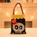 Black Halloween felt treat bag featuring skeleton design and striped handles - Skull Pattern