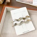 Two-piece acetate hair clips with gray and beige marble patterns and gold metal base - 2 Pieces/Pack (6.8cm) / Phantom Grey