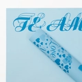 Light blue waterproof floral wrapping paper with heart patterns and Te Amo lettering - Heart Language - Blue