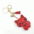 Sparkling red rhinestone cartoon cat keychain with golden bell and fringe tassel charm - Red Black Whiskers