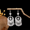 Ethnic style silver tassel earrings with hollow flowers and crescent moon dangles - Hollow Flower Moon Base Multi-head Tassel Style (E2871-6)