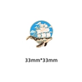 33mm round enamel pin with black whale, white sailboat, and starry night sky on gold metal - Sailboat Whale