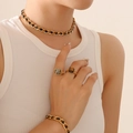 Gold chain necklace and bracelet set with leopard and tiger eye stone rings on model - P256-Gold Color Black Zirconia Necklace-35+5cm