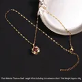 Gold plated titanium steel spinning clover necklace with red zircon pendant for women - Red Gem Petal Border (A696)