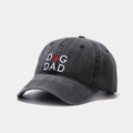 Detail of Dog Dad embroidery and paw print on washed black vintage cotton baseball cap - DAD Black