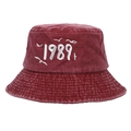 Close-up of seagull embroidery and 1989 text on a burgundy cotton baseball cap - Adjustable / Burgundy