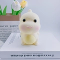 Cute creamy yellow cartoon dinosaur night light lamp made of soft resin material - White Dragon Baby